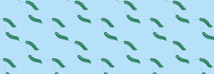 green twigs on a blue background pattern
