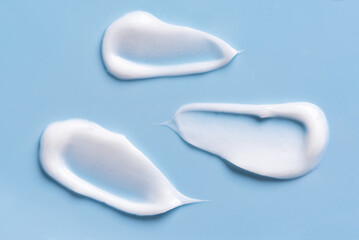White cosmetic cream smudge swatch pattern