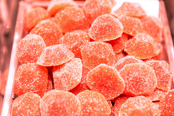 Fruit jelly candies in a box, closeup of photo. Fruit jelly for sell in the store