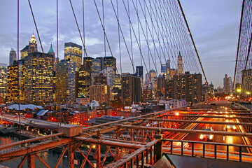 Brooklyn Bridge with traffic in downtown Manhattan New York City