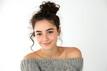 Pretty Young Woman in Off-the-Shoulder Sweater and Messy Bun photo on white isolated background --ar 3:2 --v 6 Job ID: 9b8208ec-5956-4341-9394-eb178b22f9b9