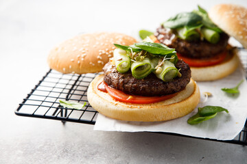 Traditional homemade burgers with spinach