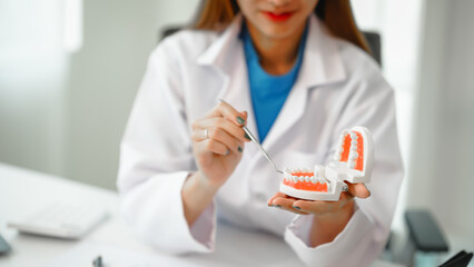 Engaging dental consultation with a female model discussing men's dental appointments at a...