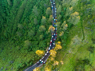 Aerial view of adventure tourist car for mountain Bromo vocalno viewpoint in parking area, Indonesia - 748633005