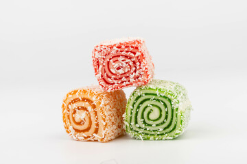 Traditional Turkish delight isolated on white background. Close up.