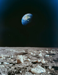 Garbage bags and plastic bottles on the moon. Wide-angle view from the surface of the Moon to the blue Earth.