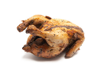 A whole delicious roasted chicken seasoned with herbs isolated on white background clipping path