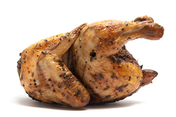 A whole delicious roasted chicken seasoned with herbs isolated on white background clipping path