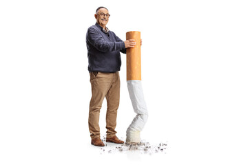 Full length portrait of a happy mature man putting off a big cigarette