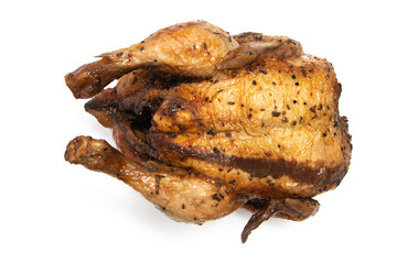 A whole delicious roasted chicken seasoned with herbs top view isolated on white background clipping path
