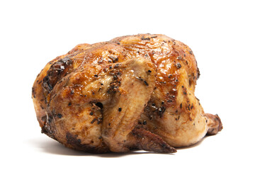 A whole delicious roasted chicken seasoned with herbs isolated on white background clipping path