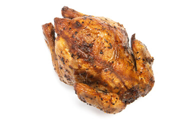 A whole delicious roasted chicken seasoned with herbs top view isolated on white background clipping path