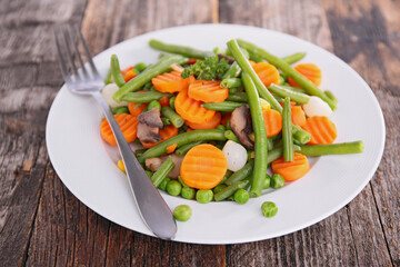 plate of stir fry vegetable- carrot, pea,bean