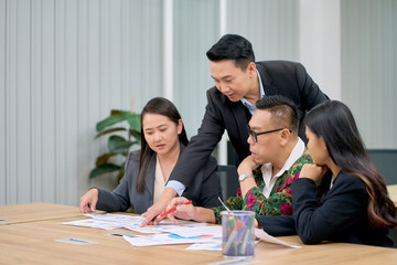 Business team working in meeting room for brainstorm marketing plan.