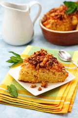 Sponge cake with apple and walnuts.