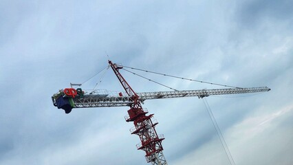 a crane is being used to lift a large object