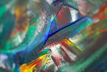 Close-up view of abstract oil paint texture on canvas. Macro shot of artistic painting palette....