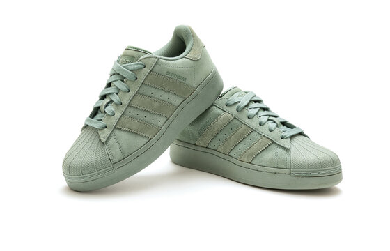Belgrade, Serbia - March 01, 2024: Adidas originals superstar green sneakers. Trainers Shoes hip hop style vintage sneaker trainers. adidas superstar trainers, stylish retro new york fashion