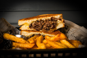 grilled cheese with beef and French fries