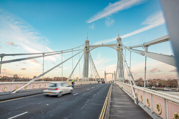 Fototapeta na wymiar Albert Bridge is a road bridge over the River Thames connecting Chelsea in Central London