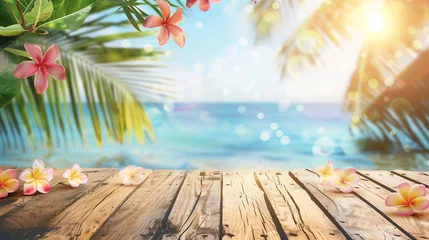 Muurstickers An empty wooden desk adorned with plumeria flowers and palm leaves sits against blue ocean backdrop, illuminated by bokeh sunlight. Background for displaying summer and tropical beach products. © Bnz
