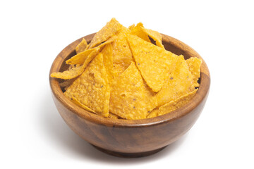 Crispy corn tortilla nachos chips in a wooden bowl isolated on white background clipping path