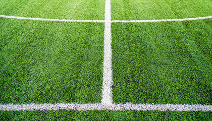 Obraz premium Line on Soccer field or football field texture background. White lines on green grass, symbol to the way to success. Sport and business background concept.