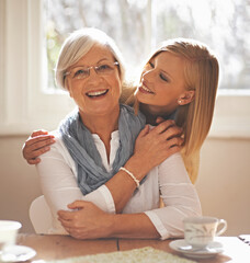 Grandmother, grandchild and happiness for bonding in portrait at nursing home with tea and...