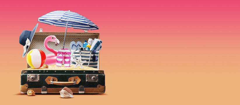 Summer vacations beach in a suitcase