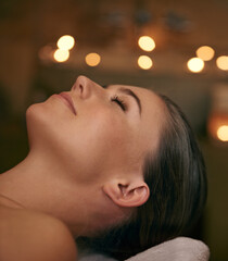 Woman, spa and candle with luxury, relax and peace with wellness and bokeh. Person, skincare and...