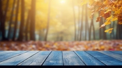 Wandaufkleber Wooden table top in the background of an autumn scene. ©  AKA-RA