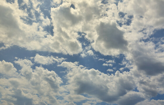 Image of clear blue sky and white clouds on day time for background usage.