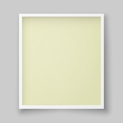 Realistic photo frame with a yellow insert on a gray background.