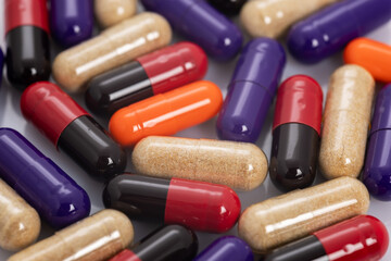 Heap of various medicine pills background. Close up