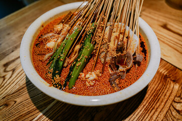 Leshan pot chicken has been a traditional Sichuan snack for 100 years, which refers to cold slices...