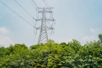 Obraz premium Inside perspective of a tall communications tower. Electricity high voltage pylon.