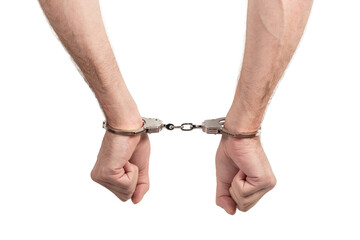 Arrested man handcuffed hands. Prisoner or arrested man, close-up of hands in handcuffs, selective...