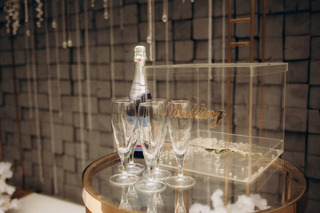 The row of champagne glasses at the party