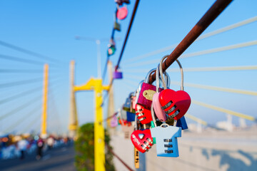 Love locks hanging on parallel bridge to Rama 9 Bridge Chao Phraya River, Thailand's first parallel...