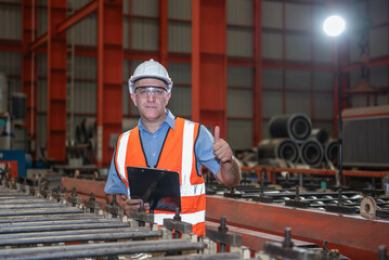 Caucasian male engineer giving thumbs up After good inspection and quality Safety confirms the concept