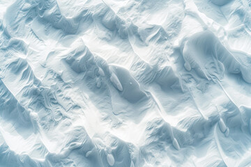 Obraz premium Wide Panoramic Winter Background with Snowy Ground: Natural Snow Texture with Wind-Sculpted Patterns on the Surface. Close-Up Top View with Copy Space.