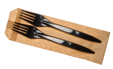 Plastic black forks and paper envelope on isolated background, top view