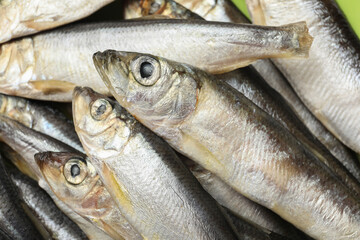 Fresh raw sprats as background, closeup view