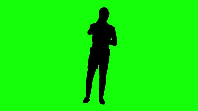 Silhouette man singer. Singing song and dancing on green screen background. Video 4K for compositing and presentation.