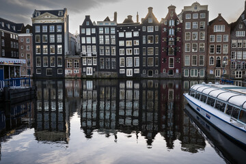 Classic Amsterdam warehouses on the Damrak, Amsterdam, Netherlands