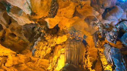 A beautiful scene inside the caves showcasing its beautiful formation of Stalagmites and...