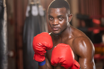 Boxer fighting through rounds with unwavering determination for victory and the champion title.