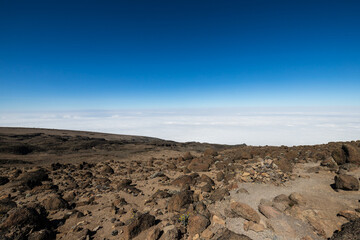Above the Clouds: Rocky Peaks and Endless Skies