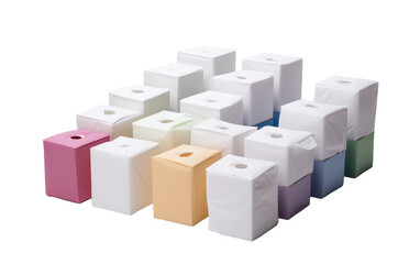 A collection of various colors of tissues arranged neatly on a seamless white background. Each tissue exhibits vibrant hues, creating a visually striking contrast against the plain backdrop.