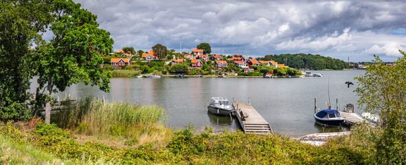 Scandinavian summer landscape of Karlskrona island on Baltic sea coast, Sweden. Brandaholm neighbourhood - 748753240